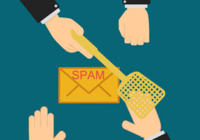 The executive hands prevent the employee from receiving and opening a spam mail, the concept of information security in companies, data protection on the internet