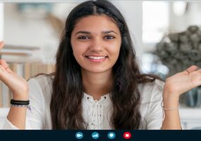 Person with a home studio setup on video call.