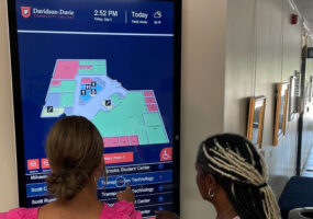 College Students using wayfinding digital signage solution at Davidson-Davie Community College campus